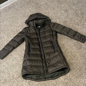 The North Face Women's olive green puffer with removable hood.  Zip up front.
